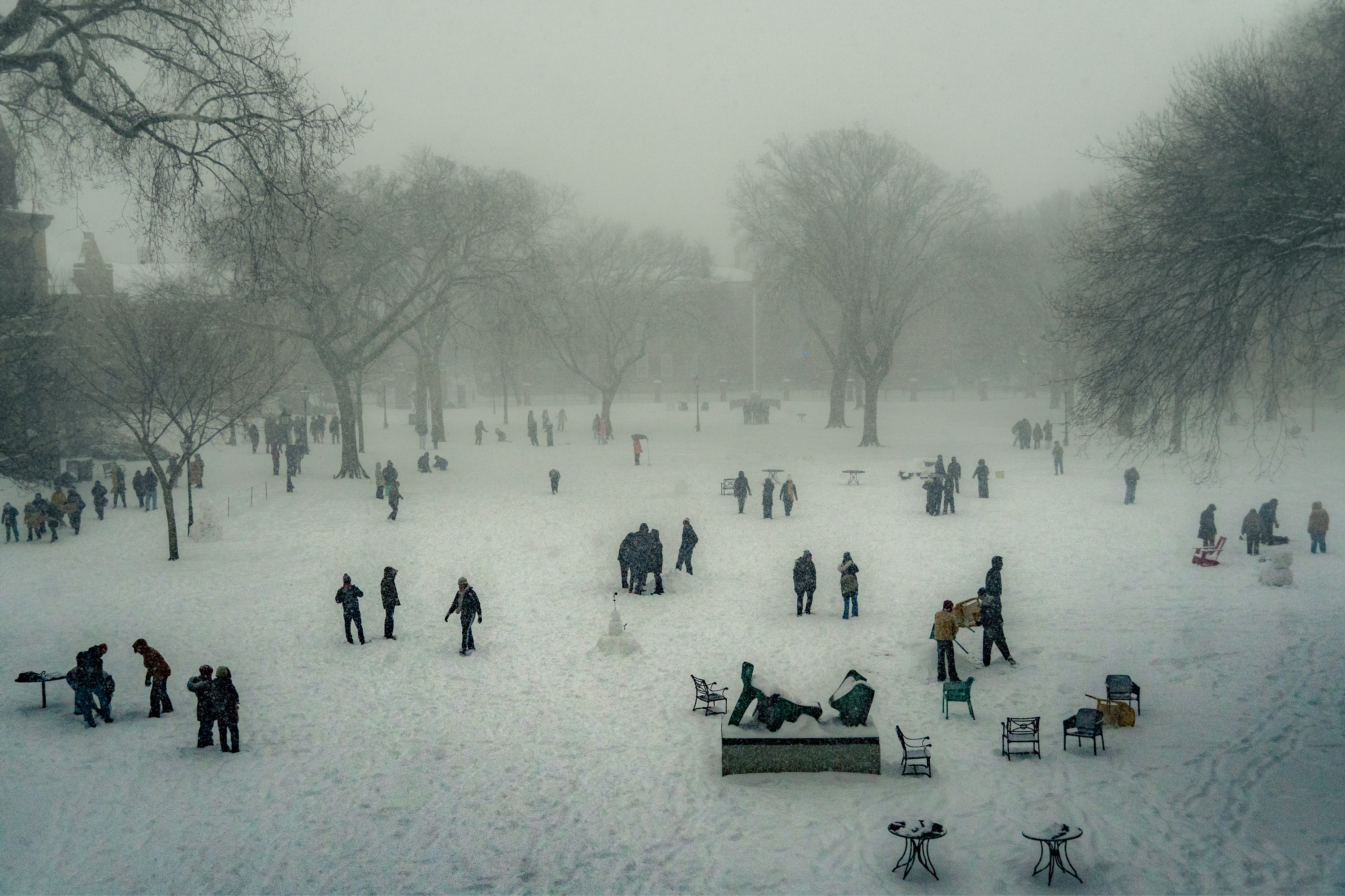 Bird's eye view photo students and snowmans on the Main Green.